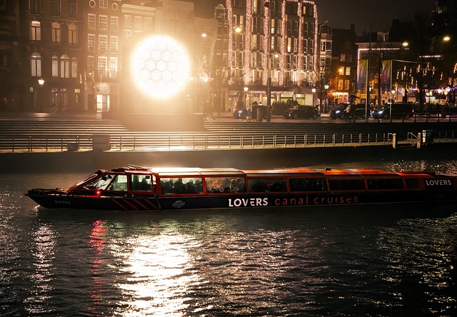 Amsterdam light festival lovers boat canal cruise artwork central station light nice 2025