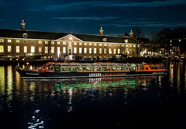Evening Canal Cruise in Amsterdam preview image in front of Hermitage