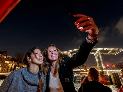 Lovers evening cruise preview girls taking selfie on water