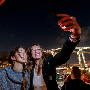Lovers evening cruise preview girls taking selfie on water
