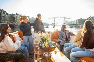 Lovely cruises people on boat enjoying views amstel