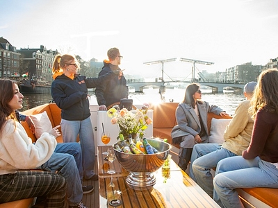 Lovely cruises people on boat enjoying views amstel