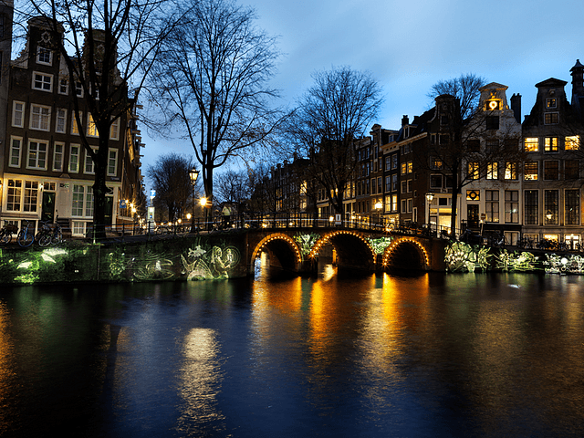 Amsterdam Light Festival Green artwork on the bridge 1000x750