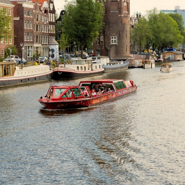 City sightseeing preview boat on canal open roof explore hop on