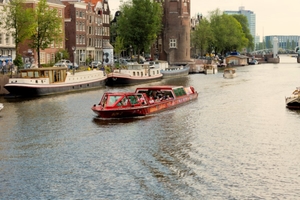City sightseeing preview boat on canal open roof explore hop on