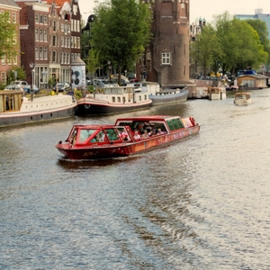City sightseeing preview boat on canal open roof explore hop on